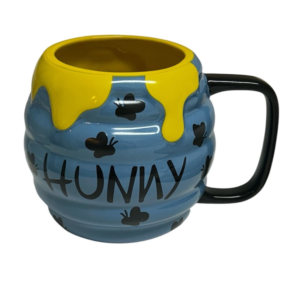Disney Parks Blue and Yellow Hunny Mug. 21 ounce‎ capacity. Color changing.